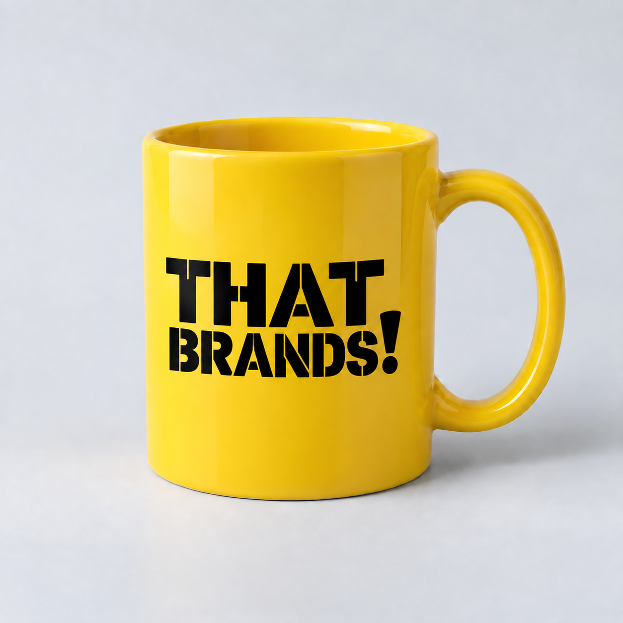 Yellow mug concept with the full That Brands! stencil logo